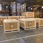 Front view of plant relocation crates containing guillotine cutting systems