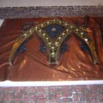 Bronze altar screen placed on Corrosion Intercept, a Polyethylene film embedded with highly-reactive copper particles which prevents metals wrapped within it from all kinds of corroding gases.