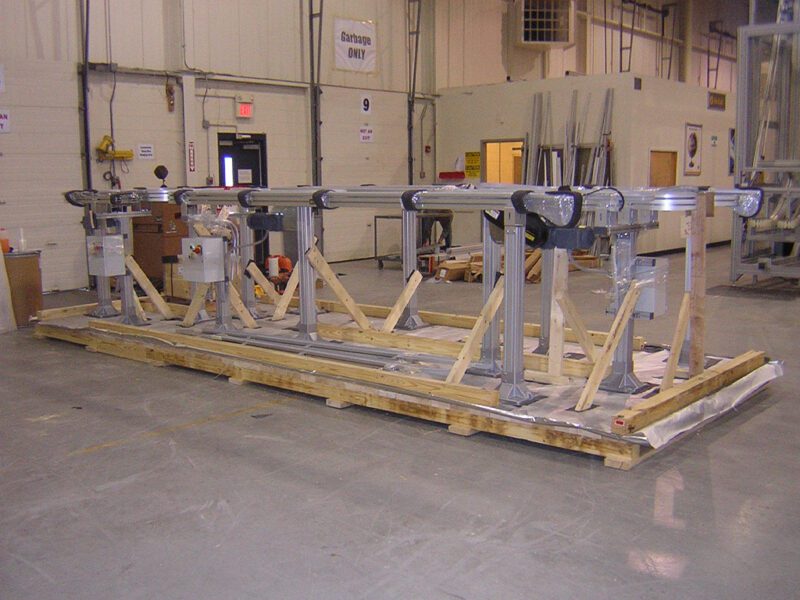 Machinery on pallet being crated in warehouse for assembly line shipping