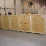 Immense machinery assembly line fullly finished and custom crated inside MSS warehouse for assembly line shipping